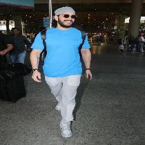 Akhil Akkineni Spotted At Airport Arrival -Photos